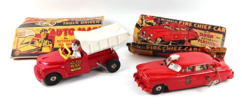 A Marx of America clockwork Fire Chief car with plastic body, siren and automatic flashing lights,
