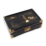 A Japanese black lacquer and shibayama style rectangular jewellery box, the lid decorated with a