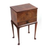 A Queen Anne style walnut sewing box on stand, 40cms wide.