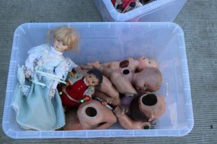 A quantity of vintage dolls, parts and other items.