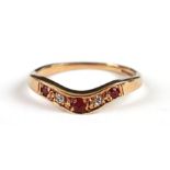 A 9ct gold ruby and diamond wishbone ring, approx UK size 'I', 1.8g.