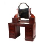 A Victorian mahogany dressing chest with central mirror flanked by two banks of three drawers