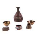 A small collection of Indian metal wares to include a pair of rice bowls, 13cms diameter; an