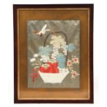 A Chinese silk embroidered panel depicting a basket of fruit with a bird, framed & glazed, 35 by