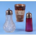 A silver mounted cut glass sugar caster; together with a silver mounted cranberry glass sugar caster