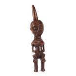 African / Tribal Art: A carved wooden standing figure, 39cms high.