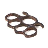 A steel knuckle duster, 10cms wide.