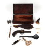 A 19th century box flintlock muff pistol with accessories, cased; together with a leather and