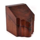 A George III figured mahogany knife box (lacking interior), 23cms wide.