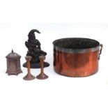 A Victorian style cast iron Mr Punch doorstop, 30cms high; together with a copper pan, 36cms