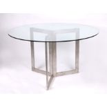 A modern design circular glass dining table in the Merrow Associates style with triform base, 130cms