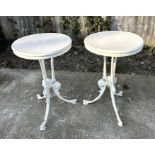 A pair of Coalbrookdale style painted cast iron side tables, each with circular wooden tops, 45cms