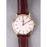 An Omega 9ct gold ladies wristwatch, the silvered dial with baton indices, approx 27mm diameter