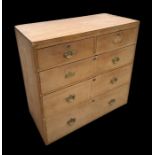 A pine chest of drawers with two short and three long graduated drawers, 97cms wide.