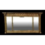 A late 19th century Regency style gilt triptych overmantle mirror, 120cms wide.