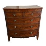 A 19th century mahogany bowfront chest of drawers, the two short and three graduated long drawers