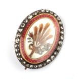 A Georgian yellow metal diamond set and guilloche enamel hairwork mourning pendant brooch, the