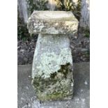 A staddle stone with associated square top, 67cms high.Condition ReportThe dimensions of the