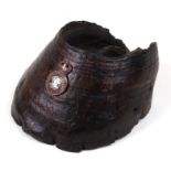 A horse hoof desk weight mounted with a British Army Queen's Own Hussars badge, 14cms wide.