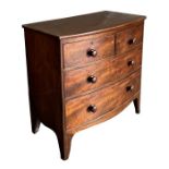 A William IV mahogany bowfront chest of drawers with two short and two long graduated drawers, on