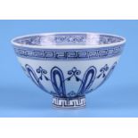 A Chinese blue & white footed bowl, 9cms high.