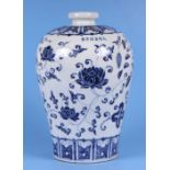 A Chinese blue & white Meiping vase decorated with scrolling flowers, 30cms high.