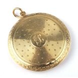 An 18ct gold pendant compact of circular form, initialled, 4.2cms diameter, 20.4g.