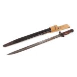 A WW1 Wilkinson Sword pattern 1907 bayonet in its leather scabbard with metal mounts and 1917