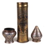 A German WWI 1917 brass shell case with damascene decoration dated 'Damascus 1918', 27cms high;