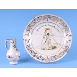 A late 18th century Delft plate decorated with a harvest figure and titled and dated 1791, 23cms