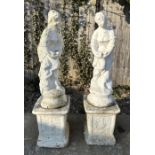 A pair of reconstituted stone classical figures on plinths, each approx 122cms high (2).