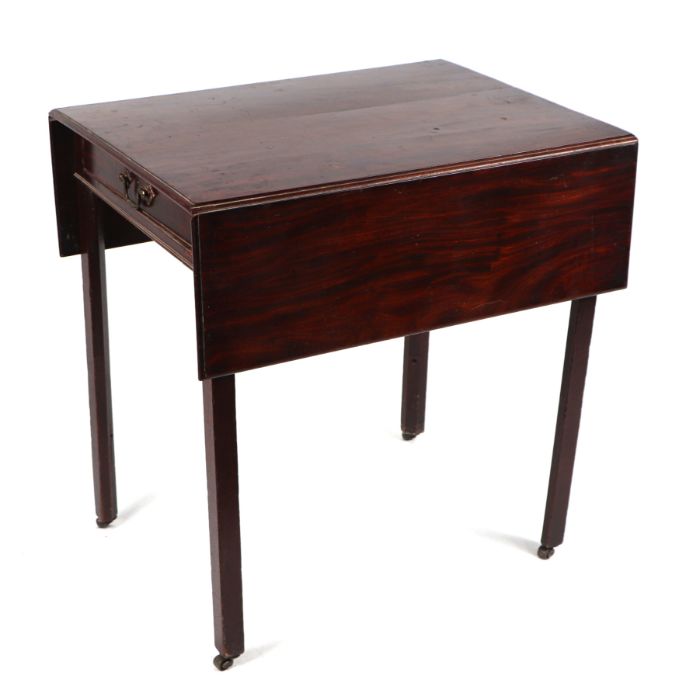 An early 19th century mahogany Pembroke table with single frieze drawer, on square chamfered legs,