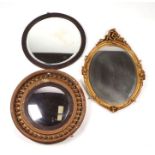 A Regency style convex circular wall mirror, approx 60cms diameter; together with two other