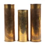 A matching pair of 1918 dated trench art brass shell cases inscribed with vases of flowers 27cms (