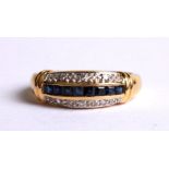 A yellow metal diamond and sapphire dress ring, approx UK size 'O', 4.3g.