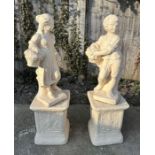 A matched pair of reconstituted stone figures depicting a boy and girl carrying baskets of