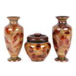 A pair of Royal Doulton stoneware leaf pattern vases of baluster form, 30cms high; together with a