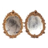 A pair of gilt gesso wall mirrors, overall 47 by 63cms (2).