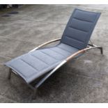 An Indian Ocean design Plaza stainless steel and teak lounger.