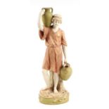 A Royal Dux figure - The Water Carrier - number 2295, 28cms high.