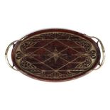 A German Arts & Crafts brass inlaid oval two-handled tray, 40cms wide.