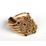 An Turkish yellow metal multi-band gem set harem ring composed of five separate bands joined at