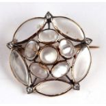 A 19th century moonstone and diamond brooch by Carlo & Arthur Giuliano in the form of a stylised