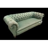 A large late 19th century country house upholstered Chesterfield sofa. 228cm wide