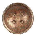 An Indian Benares brass Dhal shield with original straps and pad to the reverse, approx 37cms