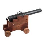 A late 19th / early 20th century French Signal Cannon mounted on a wooden carriage. Having a cast