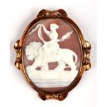 A 19th century yellow metal mounted large cameo brooch depicting a classical woman riding a lion,