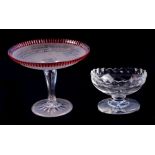 An 18th / 19th century cut glass table salt, 16cms wide; together with a cut glass comport with ruby