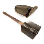 A WW2 US Army folding spade in its canvas carry case. The spade impressed US AMES 1944 with the