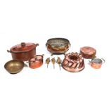 A Victorian copper jelly mould, 23cms diameter; together with a copper pan and cover, 17cms wide;